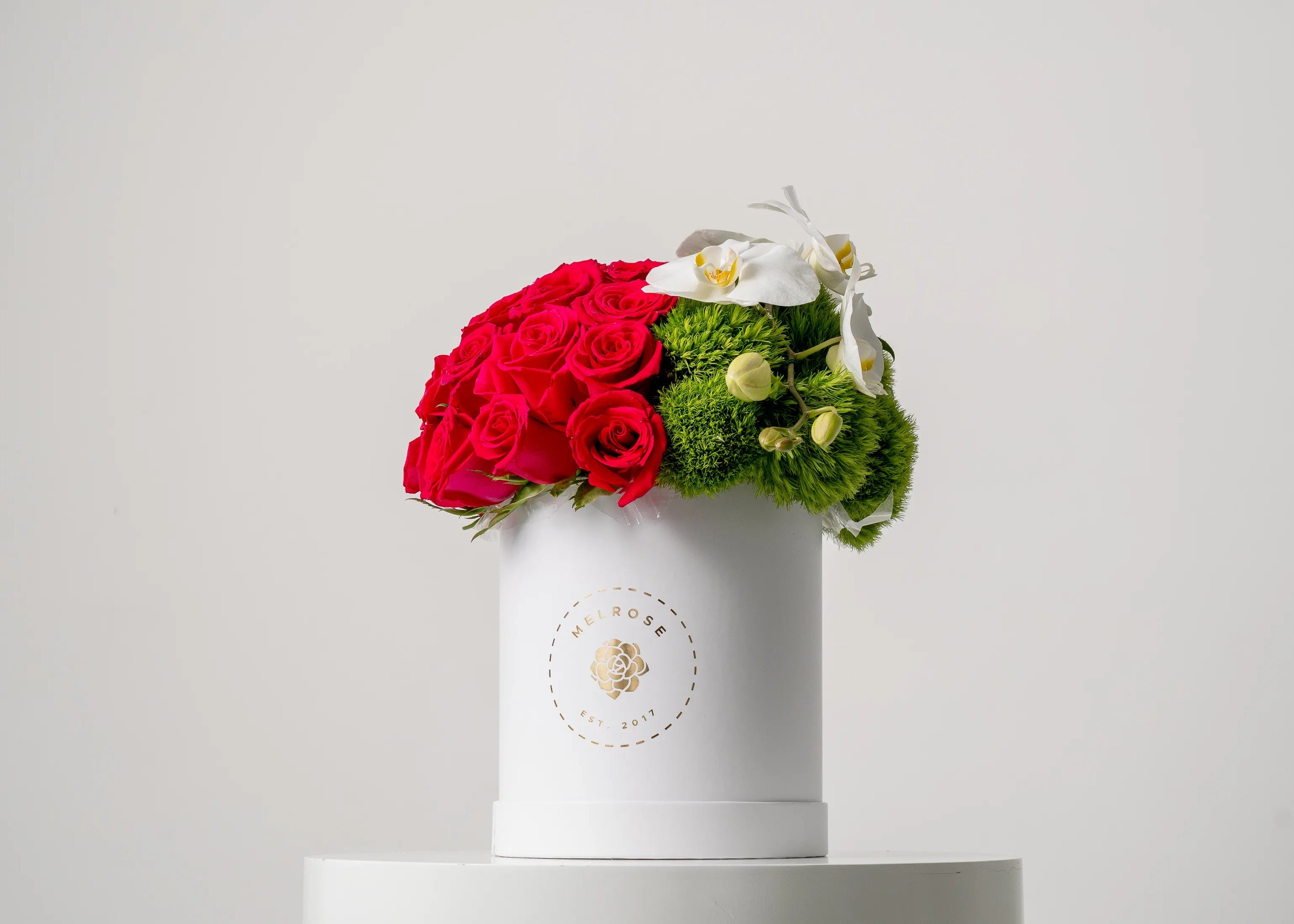 caja rosas rojas orquidea elegante